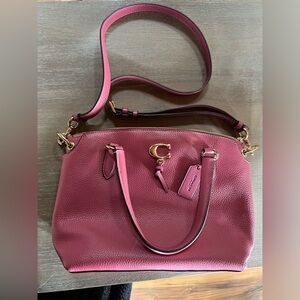Pink Coach purse with gold hardware